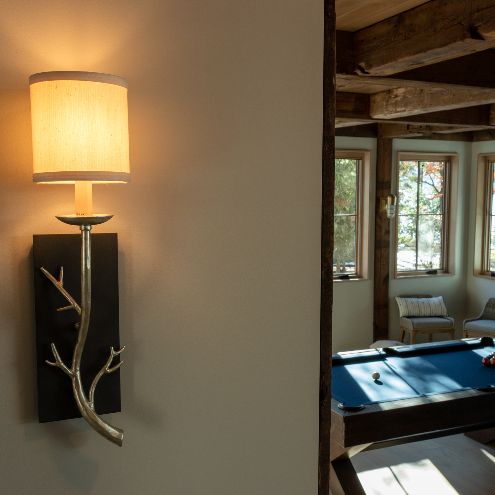 AJA speced a decorative sconce in a camp style twig design to accent the great camp style of the new lake house residence. 