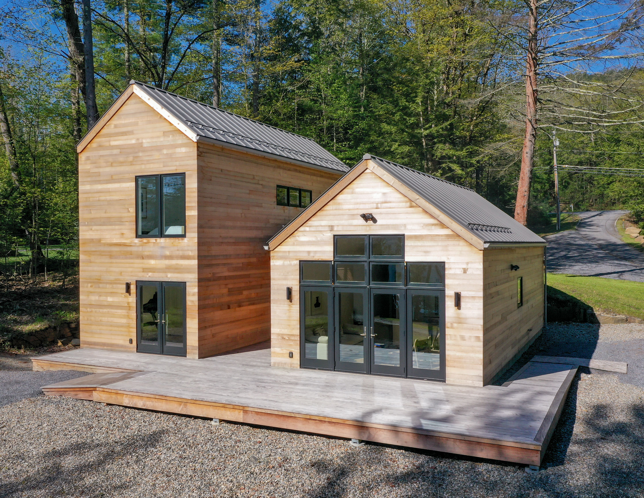 Rock View Cabin Tucked into the trees behind an overlooking Lake George Summer Home, this modern guest cottage retreat gives peaking Adirondack Views.