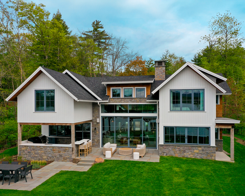 Harper's Fin is a new residence designed by AJA Architecture and Planning that overlooks a bay on Lake George, New York.